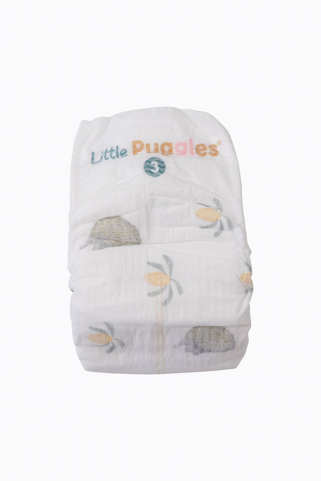 A single Little Puggles Size 3 nappy, front, showing the echidna and banksia print