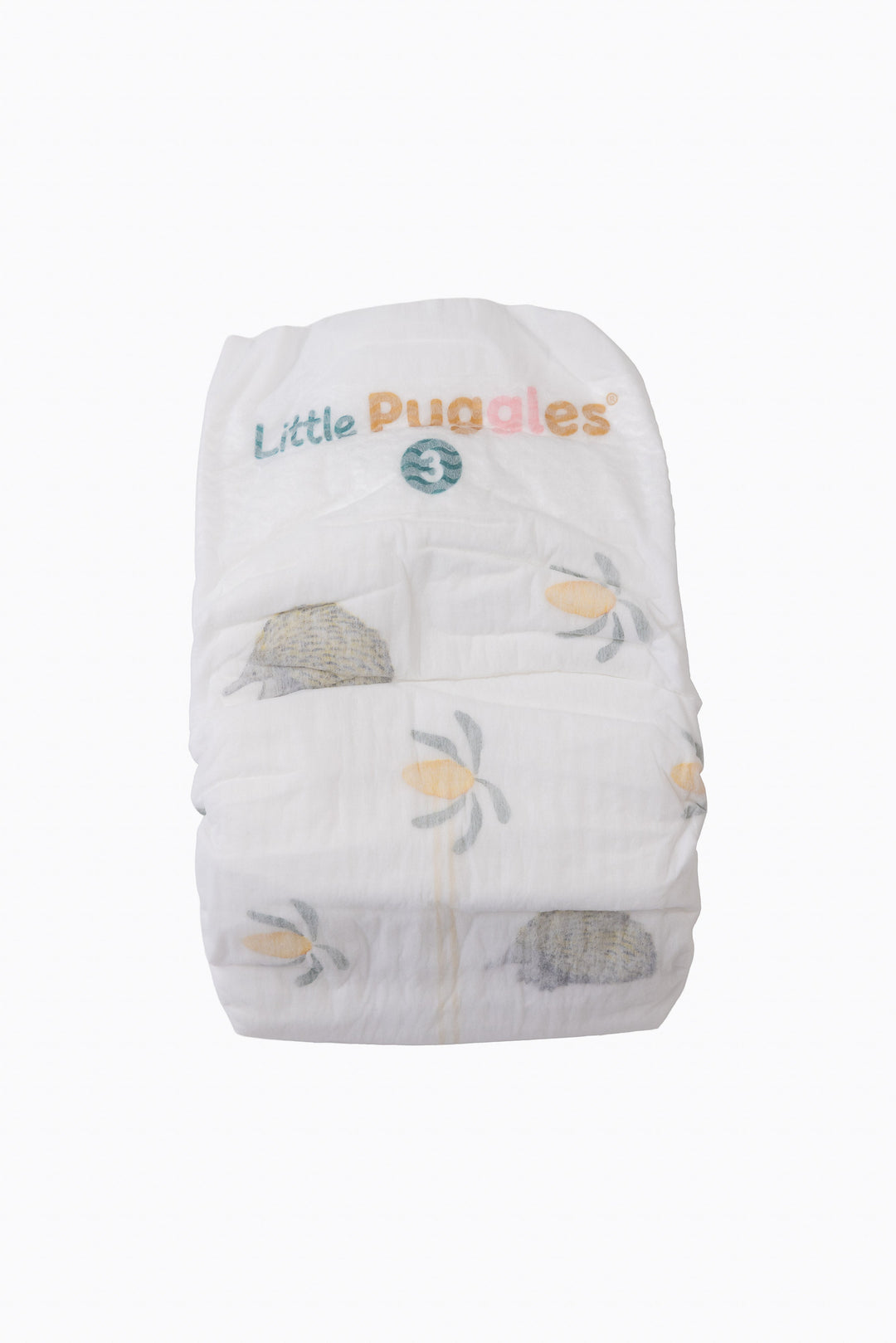 A single Little Puggles Size 3 nappy, front, showing the echidna and banksia print