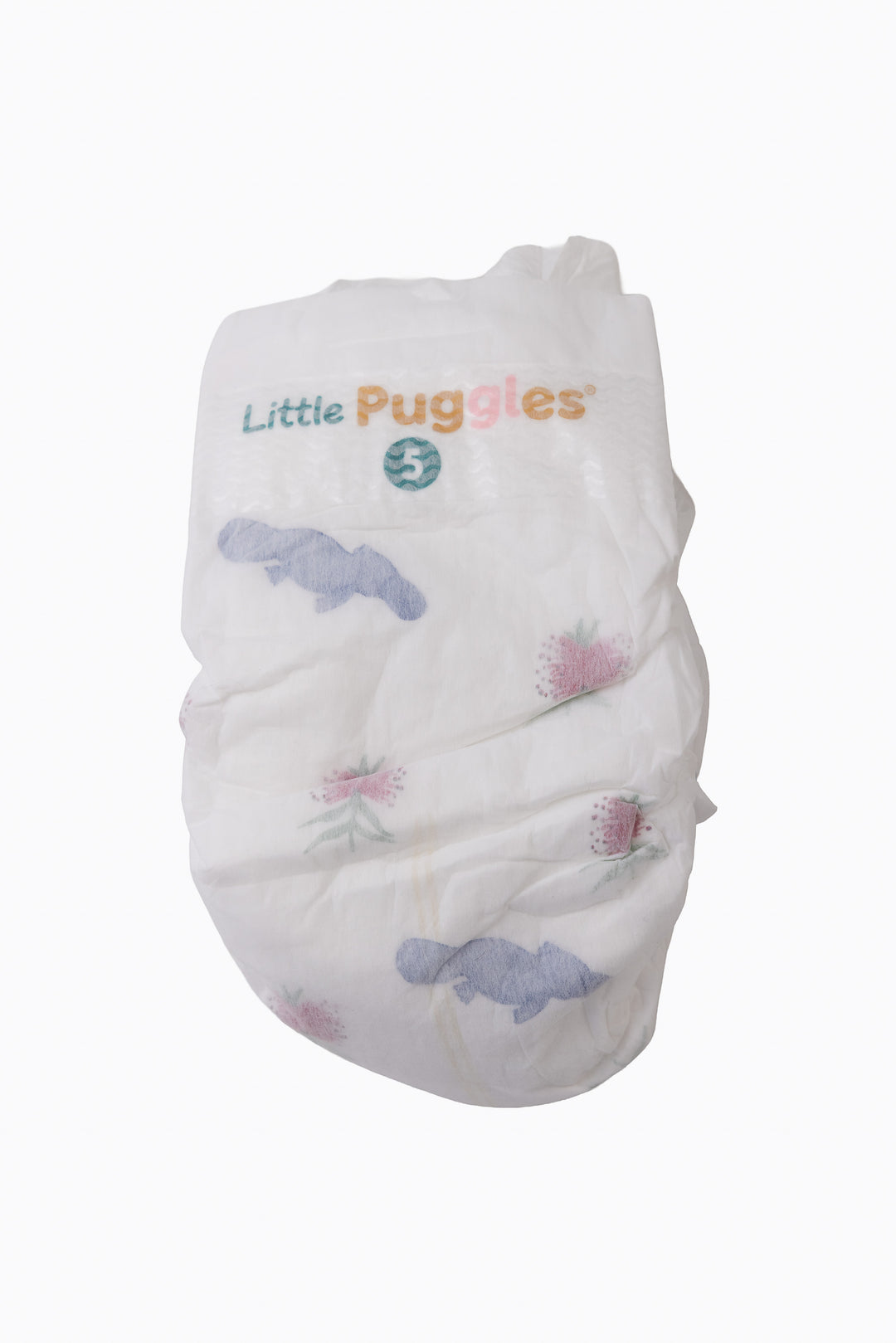 A single Little Puggles Size 5 nappy, front, showing the platypus and pink bottlebrush print